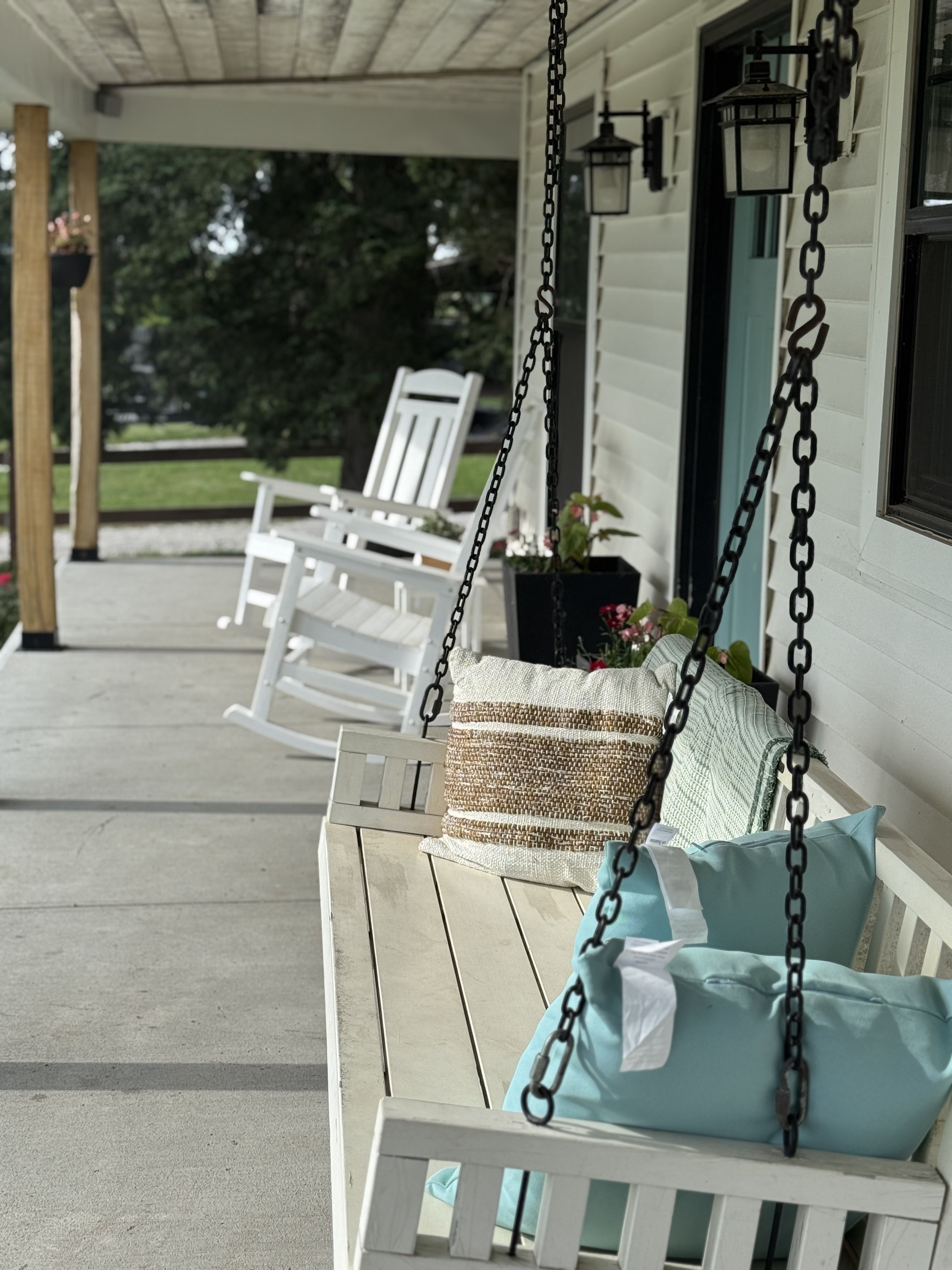 Porch swing on the Hudson's Hill farmhouse
